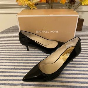 Michael Kors black patent kitten heels.